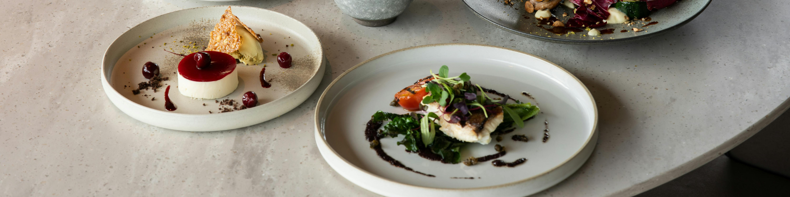 Three dishes of food on a table