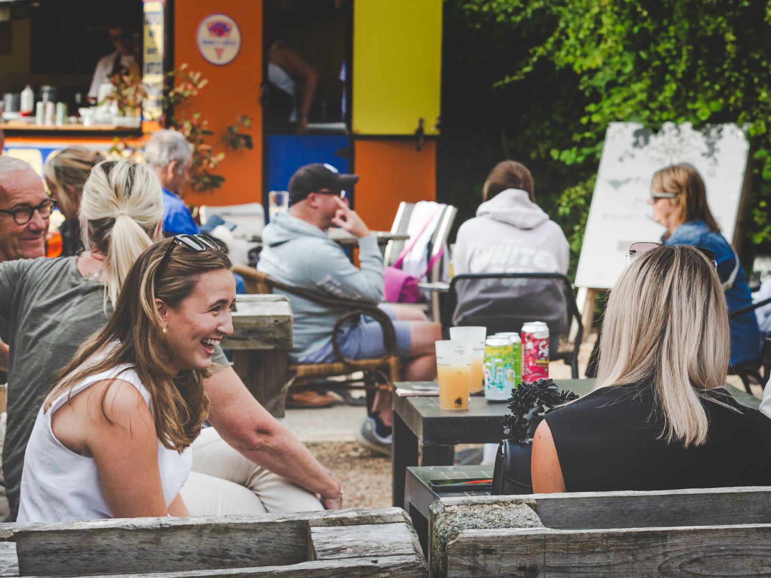 People sat enjoying the Macknade Food Village
