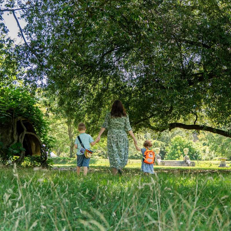 Family walking through the gardens at Quex Park