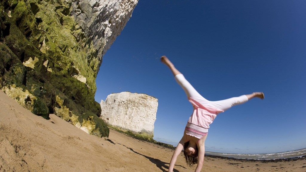 Girl cartwheel in pink.JPG
