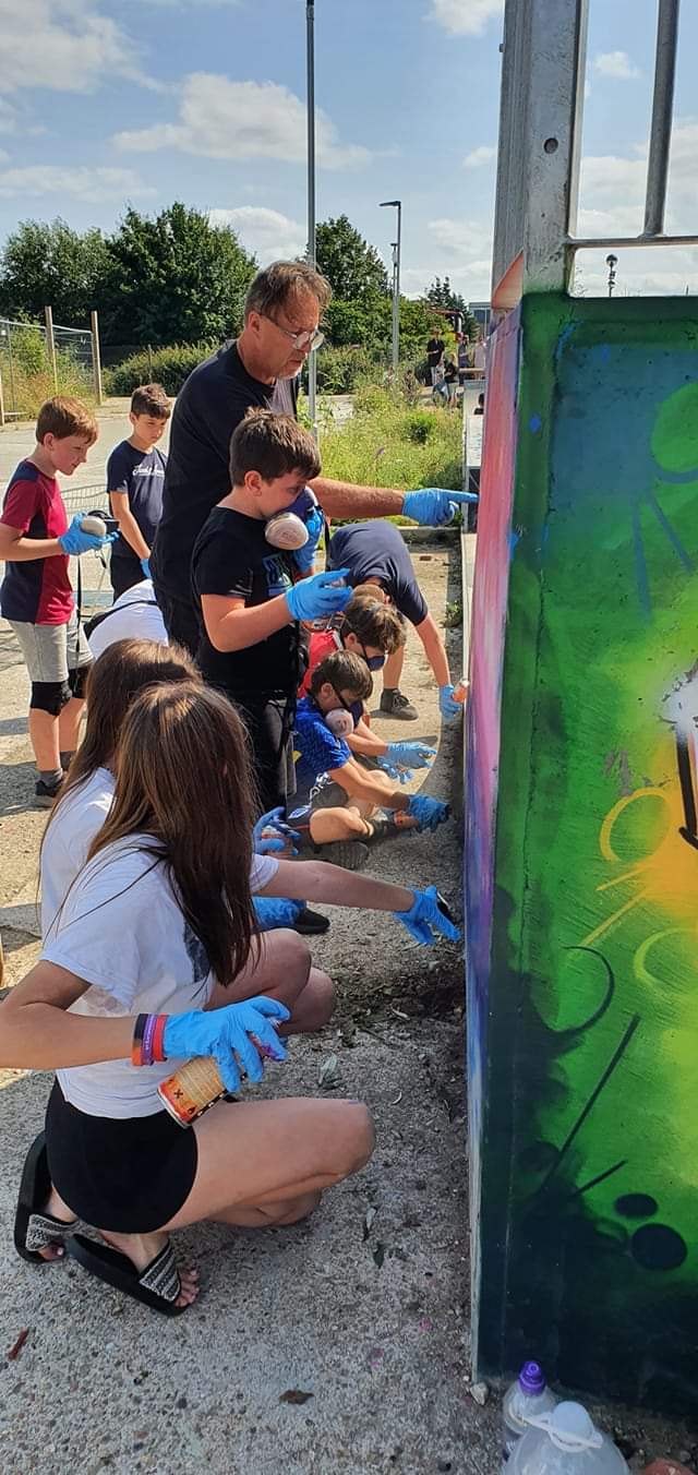 Skate Park SMSP Volunteers Painting With Justin Aggett