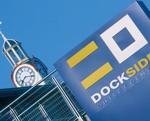 Dockside Outlet Centre exterior with large clock tower